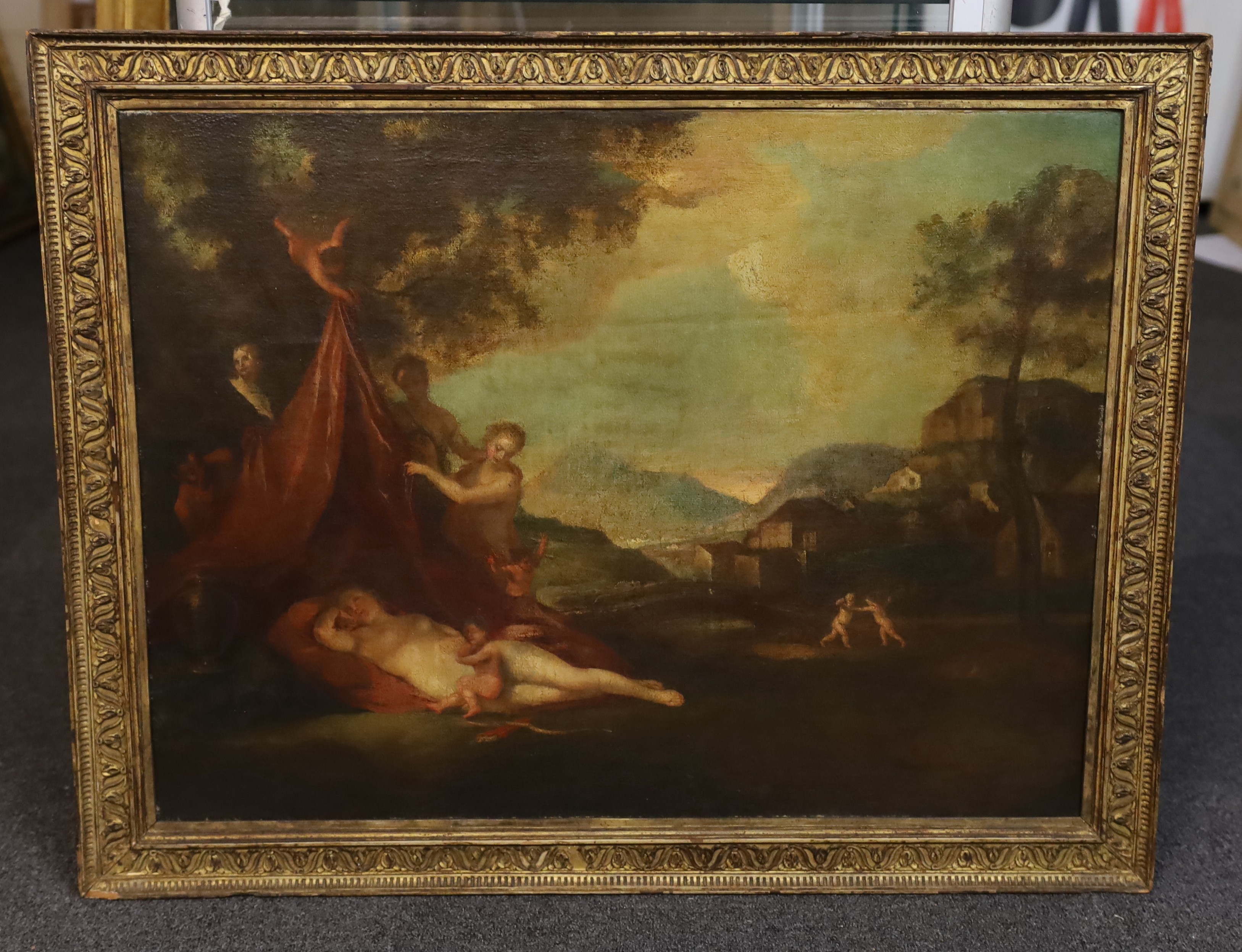 18th century Italian School, Venus sleeping in an Italianate landscape with attendants, oil on canvas, 54 x 71cm